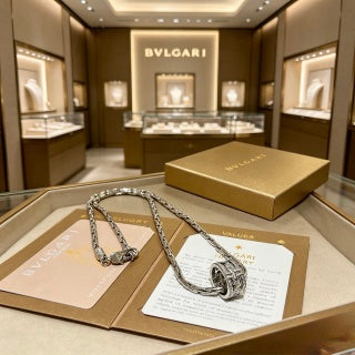 Bvlgari Silver Spiral Ring Pendant Necklace – Elegant Luxury Jewelry