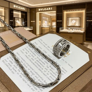Bvlgari Silver Spiral Ring Pendant Necklace – Elegant Luxury Jewelry