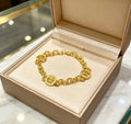 Bvlgari Gold Medallion Link Bracelet – Elegant Luxury Jewelry