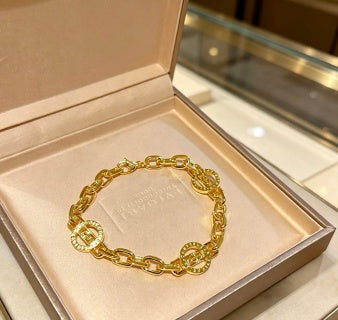 Bvlgari Gold Medallion Link Bracelet – Elegant Luxury Jewelry