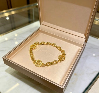 Bvlgari Gold Medallion Link Bracelet – Elegant Luxury Jewelry