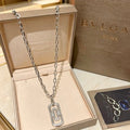 Bvlgari Silver Geometric Pendant Necklace – Elegant Luxury Jewelry