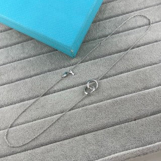 Tiffany & Co. Double-Clasp High-Polish Gold Circle Pendant Necklace with Knife-Edge Detail