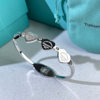 Tiffany Heart Tag Charm Bangle Bracelet – Signature Luxury Jewelry
