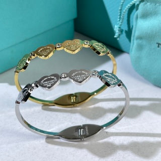 Tiffany Heart Tag Charm Bangle Bracelet – Signature Luxury Jewelry