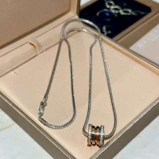 Bvlgari Silver Circle Pendant Necklace – Elegant Luxury Jewelry