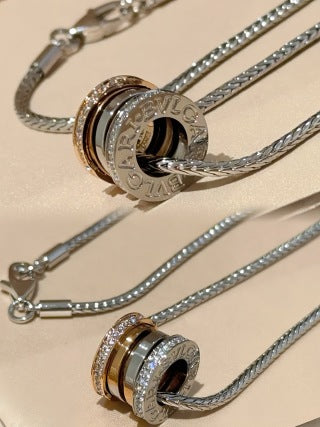 Bvlgari Silver Circle Pendant Necklace – Elegant Luxury Jewelry