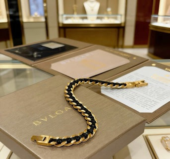 Bvlgari Black & Gold Signature Chain Bracelet – Bold Luxury Collection
