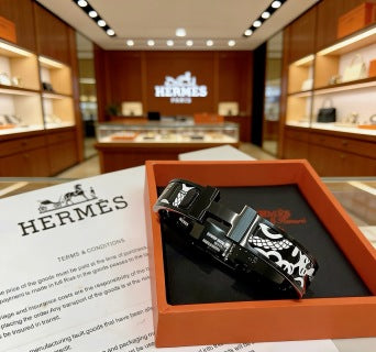 Hermès Black Enamel Signature Hinge Bracelet