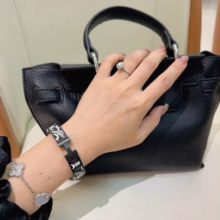 Hermès Black Enamel Signature Hinge Bracelet