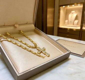 Bvlgari Gold Cross Pendant Necklace – Elegant Luxury Jewelry