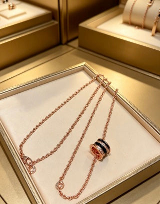 Bvlgari Rose Gold Black Accent Circle Pendant Necklace – Elegant Luxury Jewelry