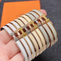 Hermès Ivory Enamel Signature Cuff Bracelet