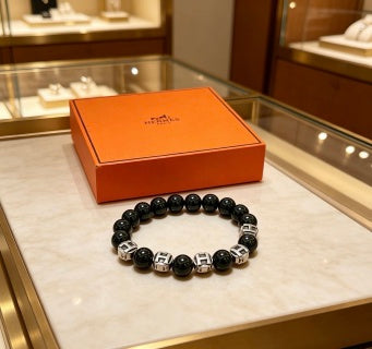 Hermès Obsidian Bead Silver Accent Bracelet