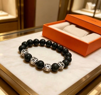 Hermès Obsidian Bead Silver Accent Bracelet