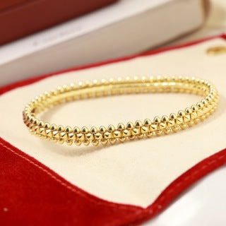 CARTIER Ravelle Studded Orbit Bangle