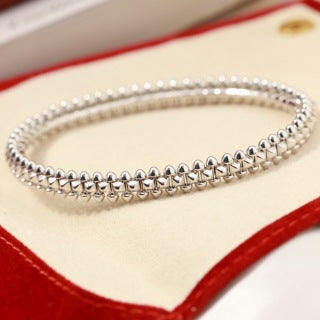 CARTIER Ravelle Studded Orbit Bangle