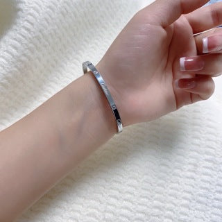 CARTIER Lucienne Minimal Engraved Bangle
