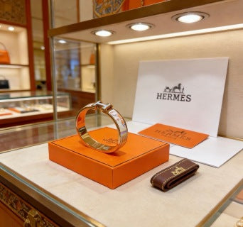 Hermès White Enamel Signature Hinge Bracelet