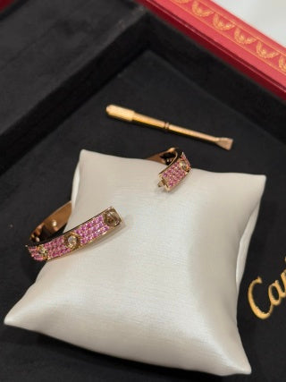 Cartier Love Collection bracelet with pavé-set colored gemstones