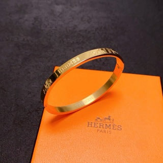 Hermès Engraved Signature Slim Cuff Bracelet