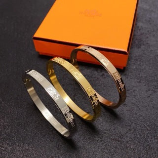 Hermès Engraved Signature Slim Cuff Bracelet