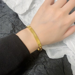 Hermès Engraved Signature Slim Cuff Bracelet
