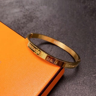 Hermès Engraved Signature Slim Cuff Bracelet