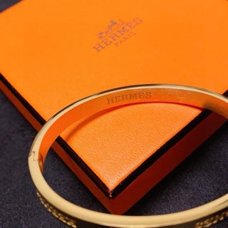 Hermès Engraved Signature Slim Cuff Bracelet