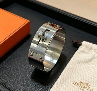 Hermès Silver Signature Lock Cuff Bracelet
