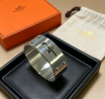 Hermès Silver Signature Lock Cuff Bracelet