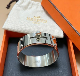 Hermès Silver Signature Lock Cuff Bracelet