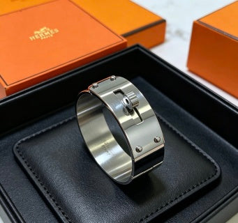 Hermès Silver Signature Lock Cuff Bracelet