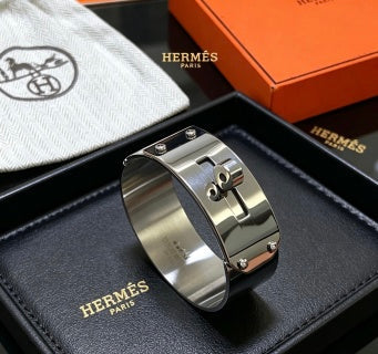 Hermès Silver Signature Lock Cuff Bracelet