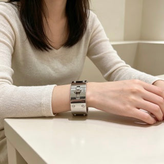 Hermès Silver Signature Lock Cuff Bracelet