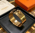 Hermès Luxe Gold Structured Cuff Bracelet 21mm