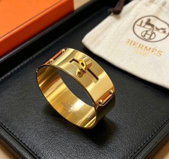 Hermès Golden Wide Hinged Cuff Bracelet 21mm