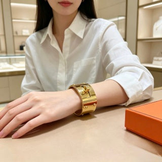 Hermès Golden Wide Hinged Cuff Bracelet 21mm